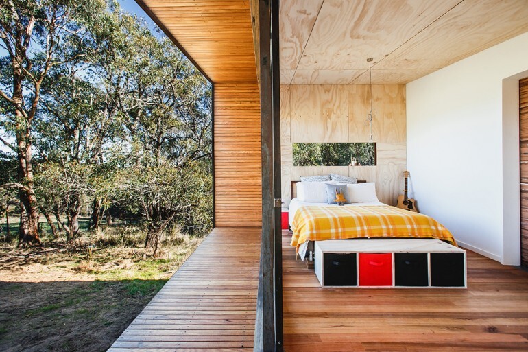 Plywood, corrugated sheeting, and rough-sawn timber were used to help maintain a modest budget (Photo: Branch Studio Architects)