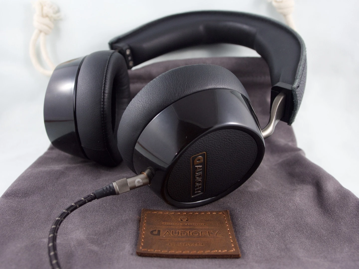 The waxed canvas carry bag completes the aesthetic on the Audiofly AF240 headphones