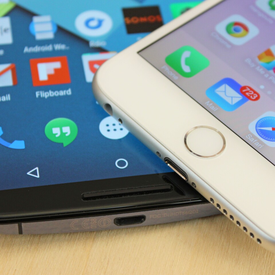 The iPhone 6 Plus (right) has a fingerprint sensor home button (Photo: Will Shanklin/Gizmag.com)