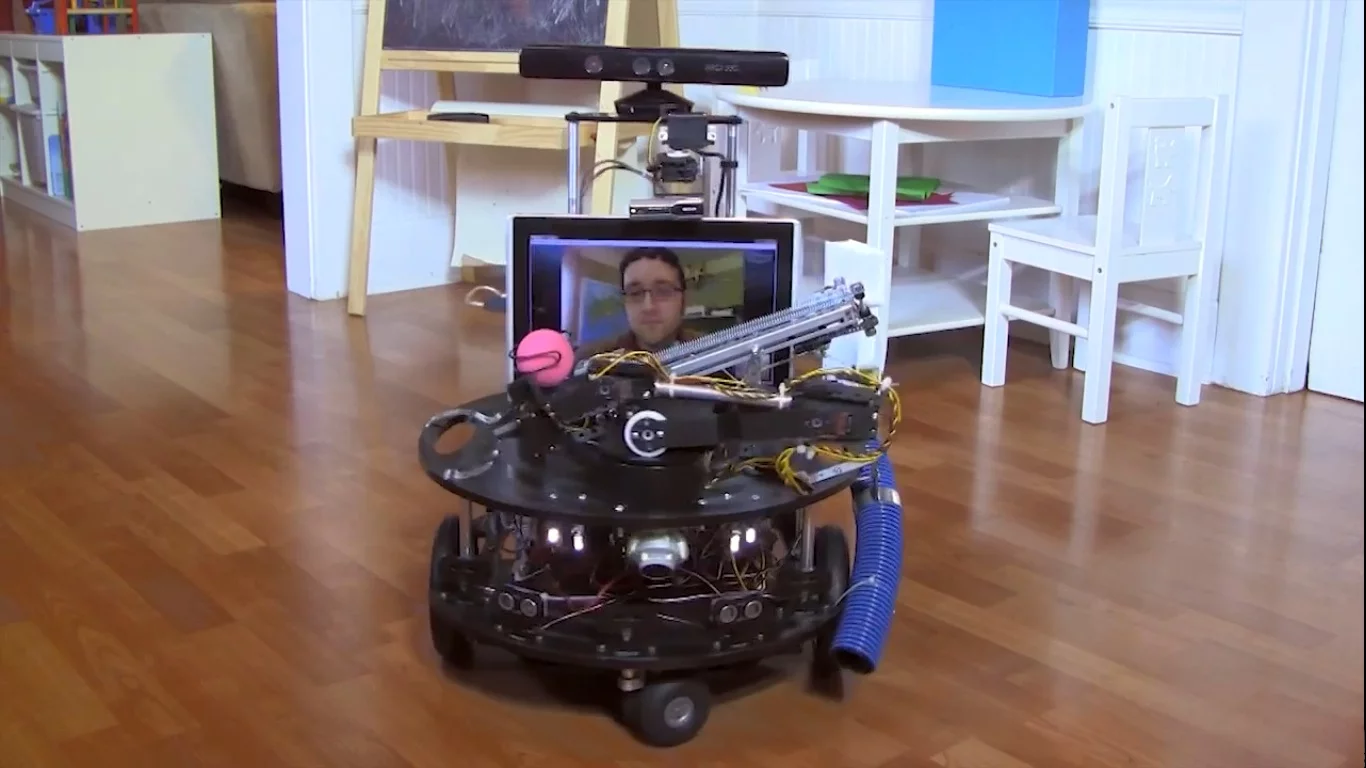 Using the Parallax EDDIE hardware platform and Microsoft Robotics Developer Studio 4, Correa constructed a robot that can interact with his dog much like he would himself