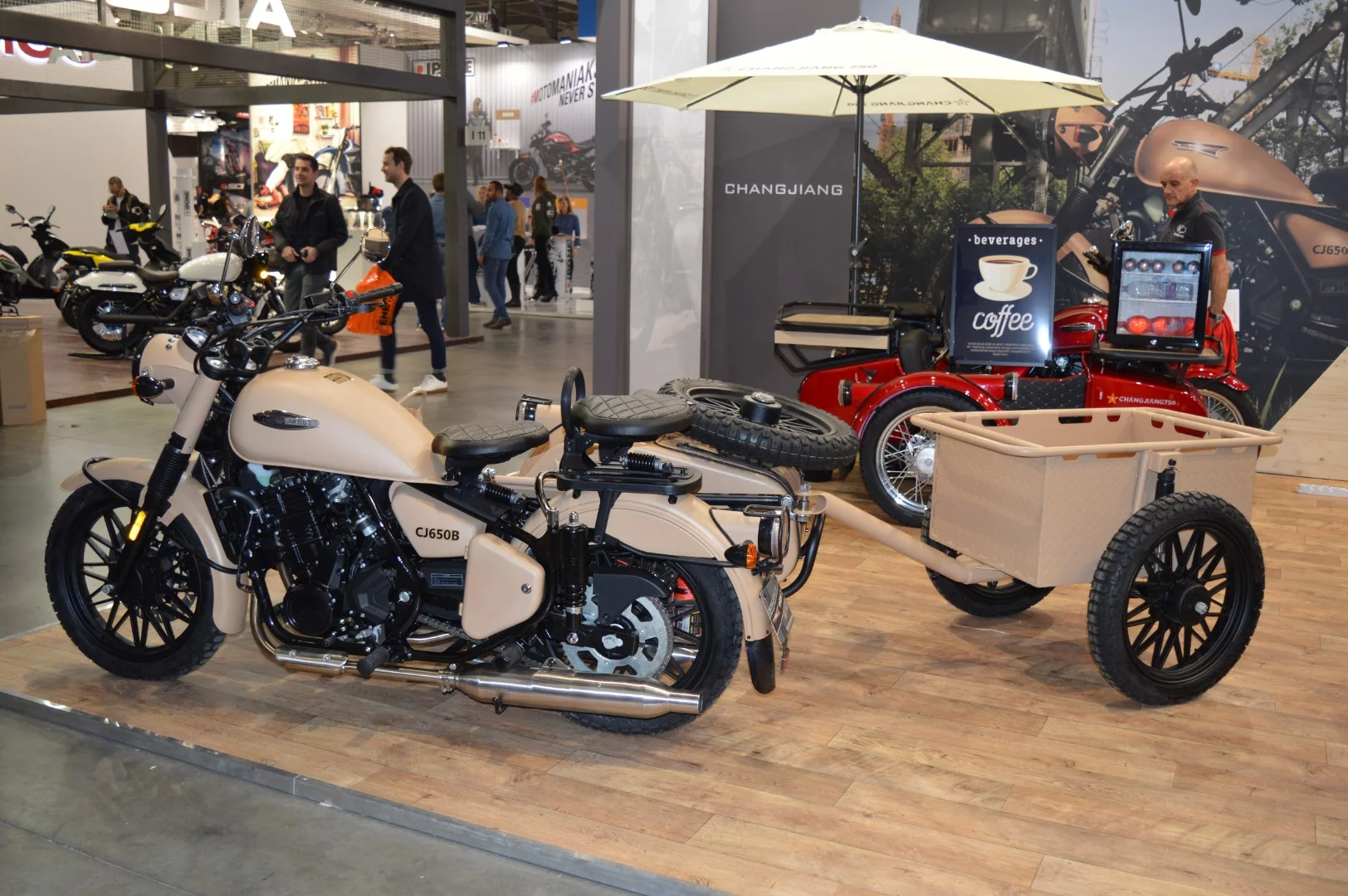 Unknown Chinese manufacturer, Changjiang, displays a classic-looking, parallel twin-powered, CJ650 motorcycle with some optional storage amenities