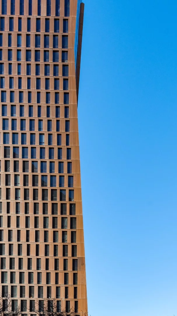 The copper cladding will give the façade a deep reddish color