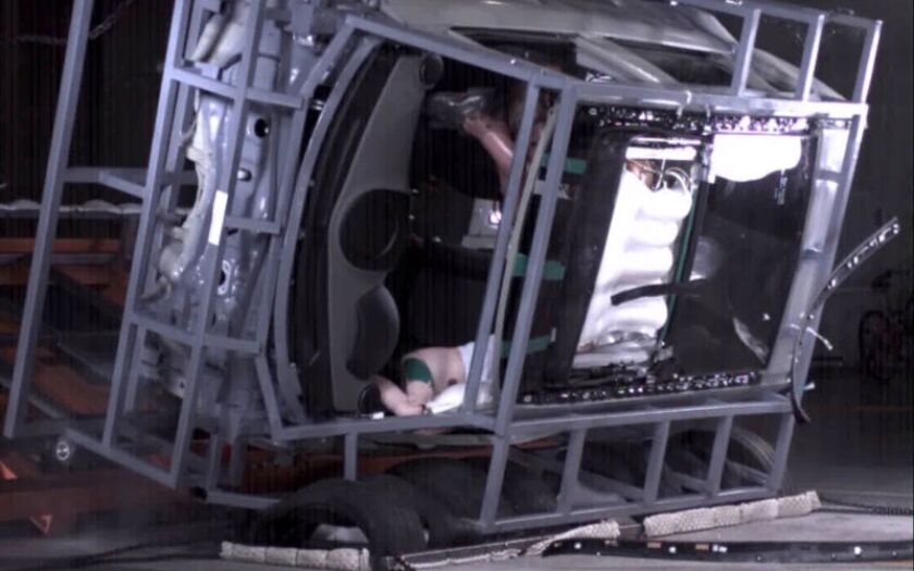 The sunroof airbag system being deployed in a crash demonstration. Notice that the sunroof appears to be in open in this scenario (pictured). The airbag is mounted in between the sunroof glass and sun shield so that it can be deployed no matter what position the sunroof is in