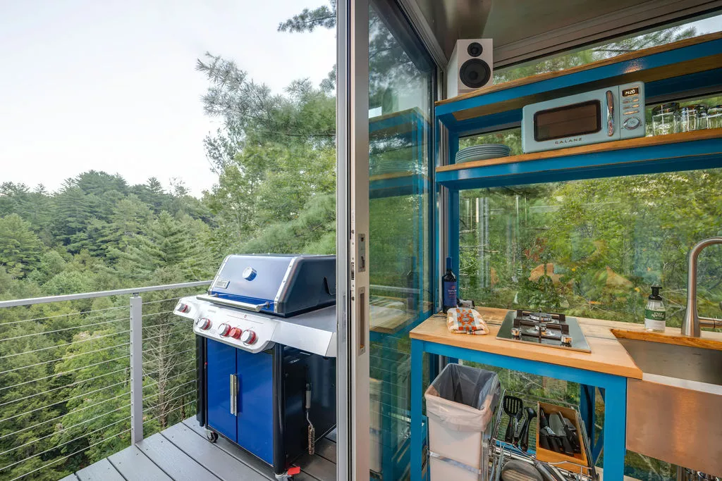 The River Forest Lookout includes a balcony area with seating and a BBQ