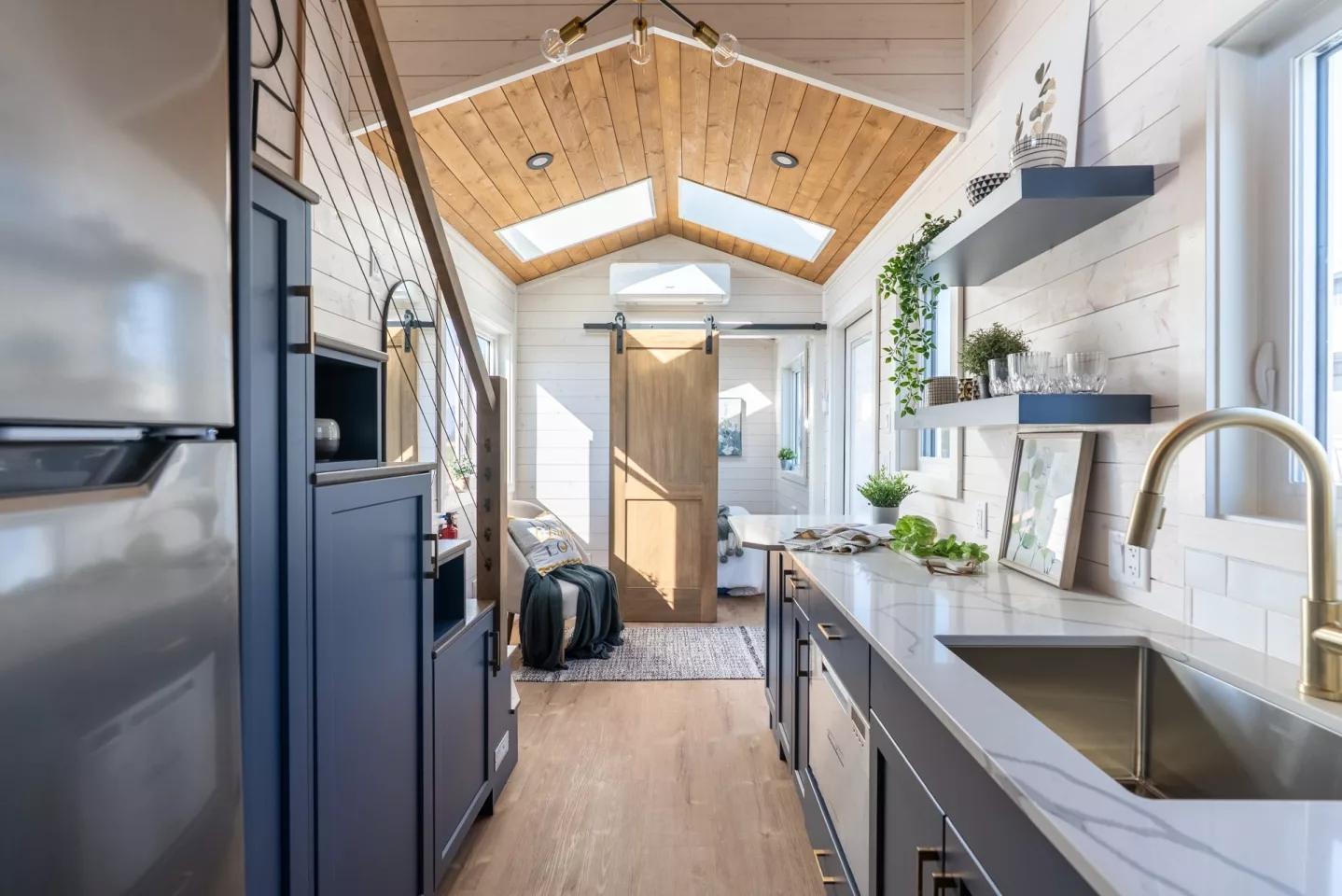 The Gambier's kitchen includes a dishwasher, a fridge/freezer, and a washer/dryer