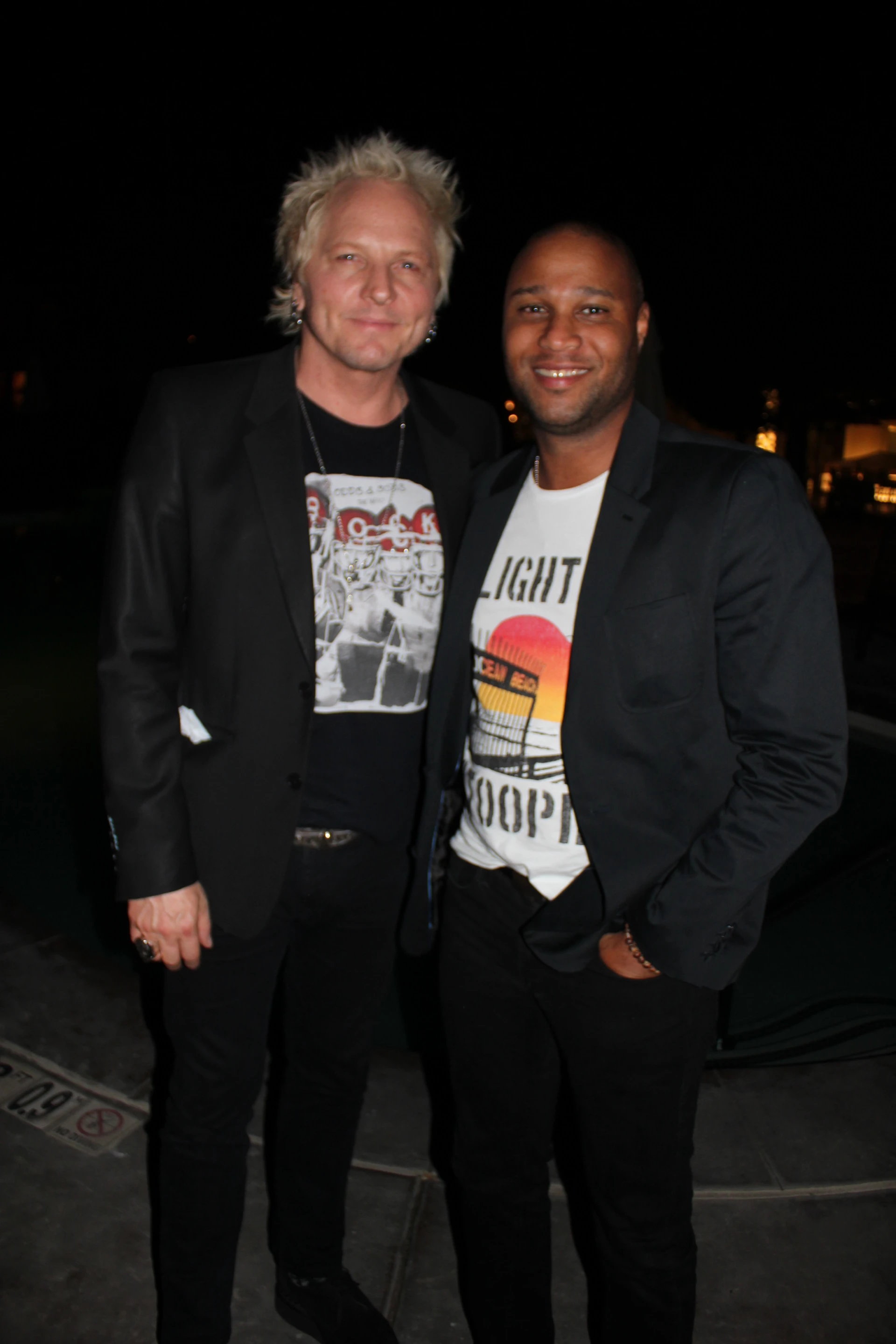 Matt Sorum of Guns N Roses wearing The Who’s Odds & Sods Musical T and film and TV director Kevin Sharpley in a Slightly Stoopid Musical T
