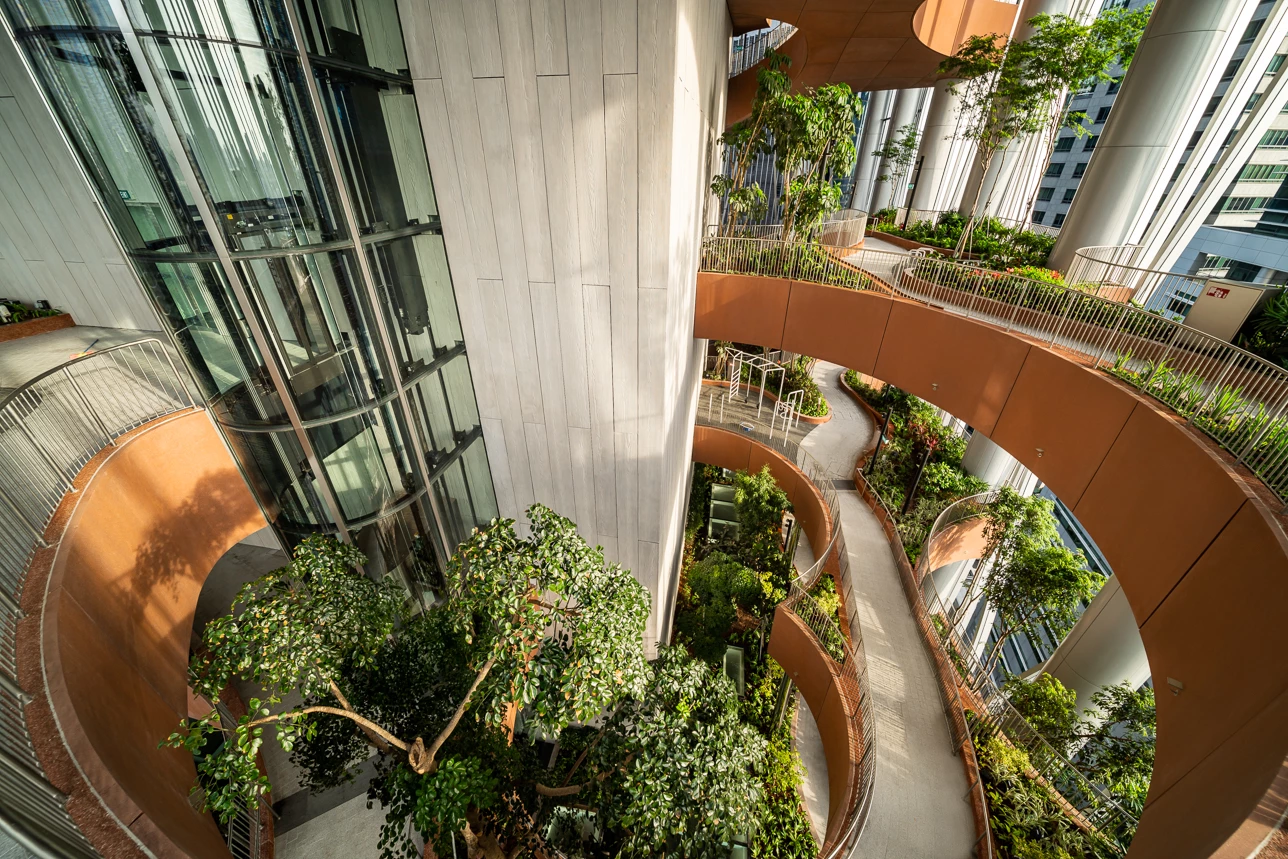 CapitaSpring's interior is filled with thousands of plants and trees that are specially chosen to thrive in the Singapore climate