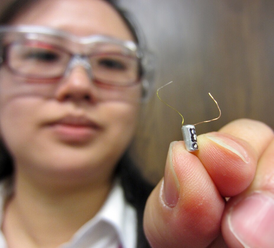 Jie Xiao with one of her batteries