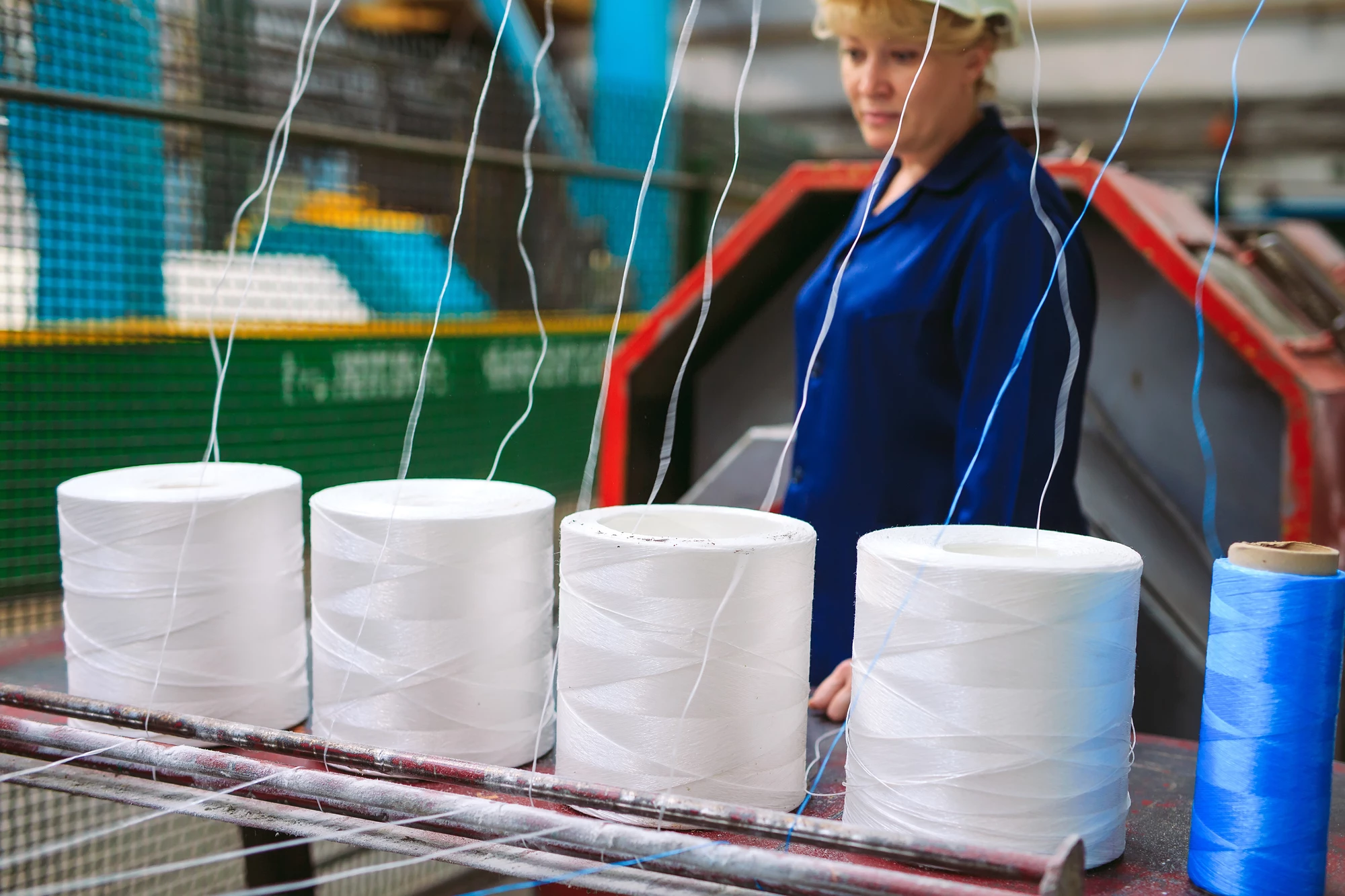 Nylon fibers have a wide range of uses, but current production methods (pictured) create harmful greenhouse gases