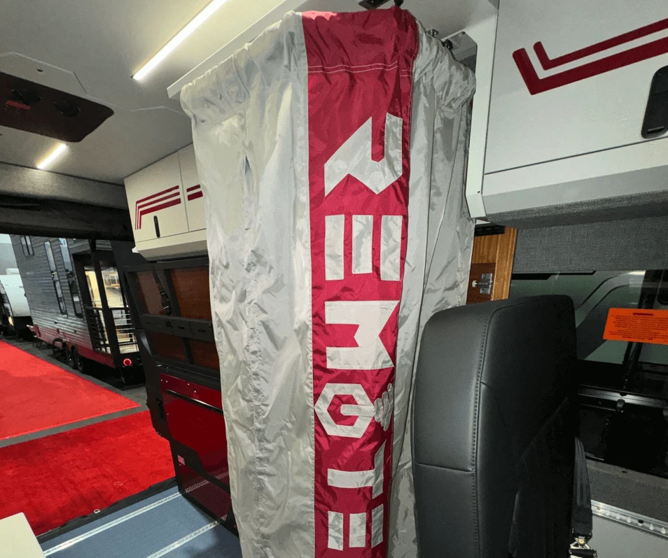 Remote Vans follows the lead of other American and European adventure van builders with a collapsible shower room that stows away in the overhead cabinet from which it hangs