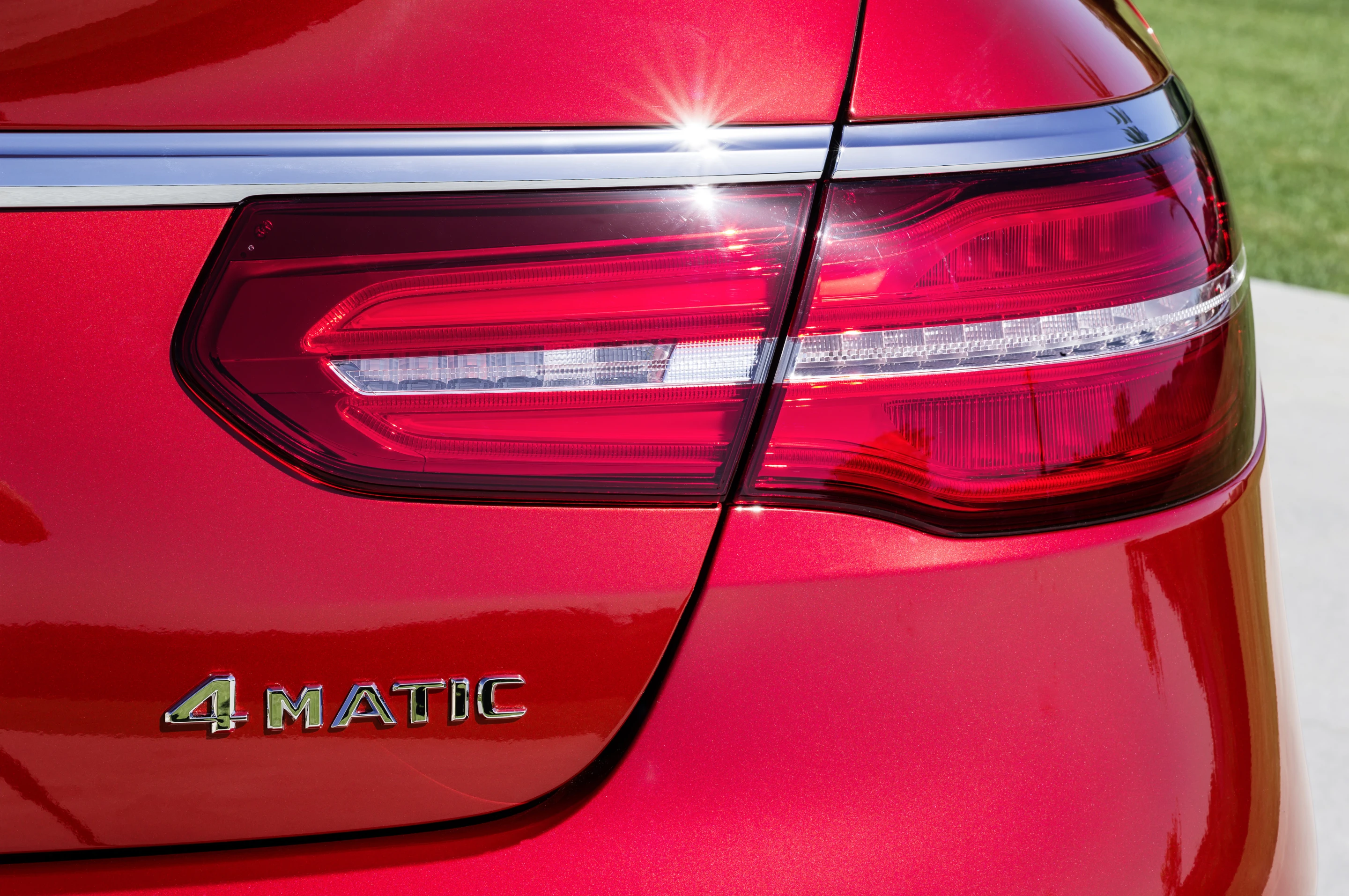 Wide, slim rear taillights and strong haunches make the car look wide and low on the road