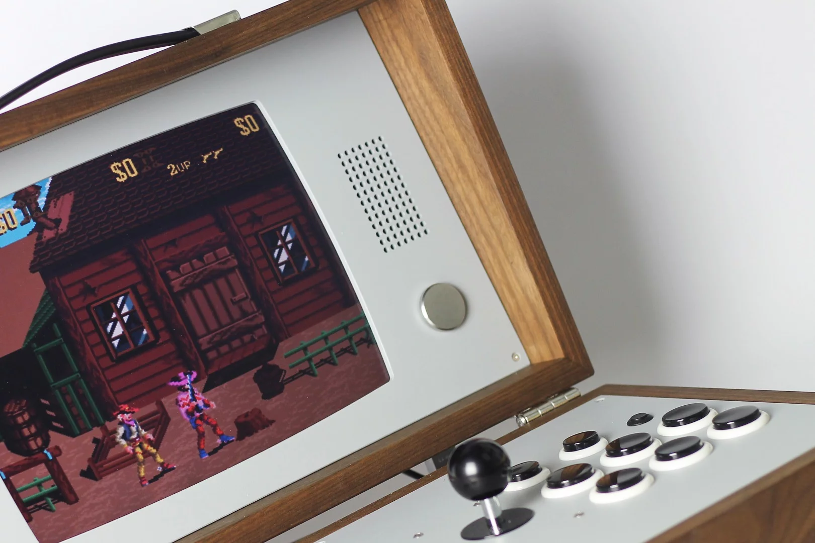 The Cary42: A two-player game console in a handmade wood case that comes with 100 games pre-installed, but can be loaded with up to 10,000 emulated games