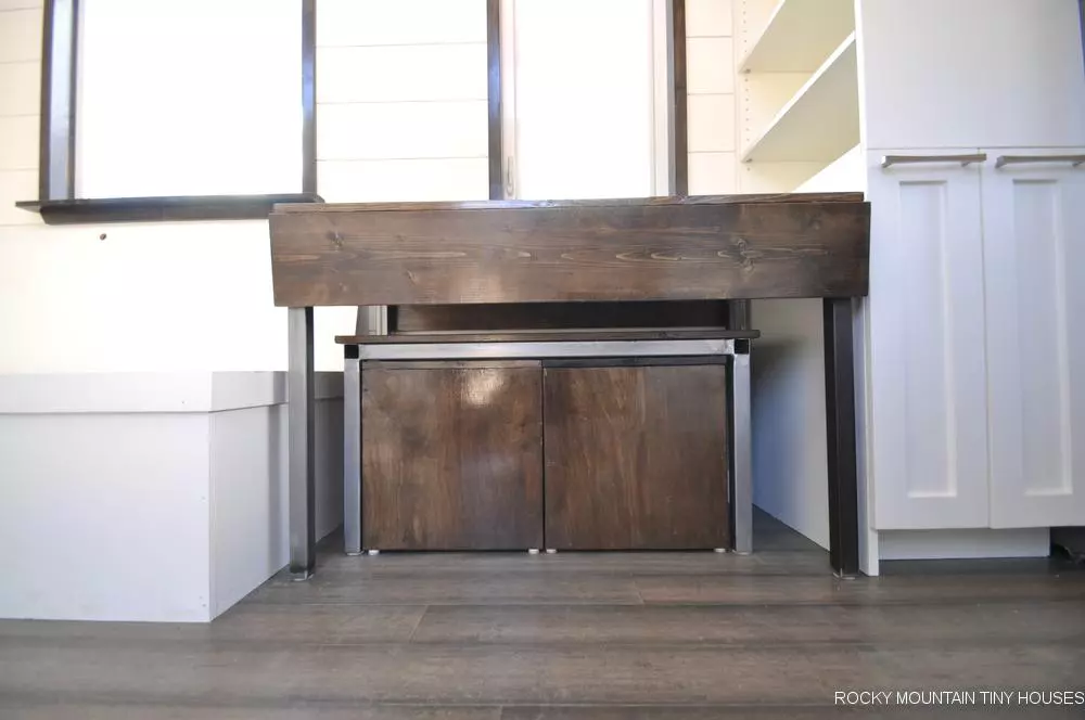 The Ad Astra's living area includes a nesting dining table