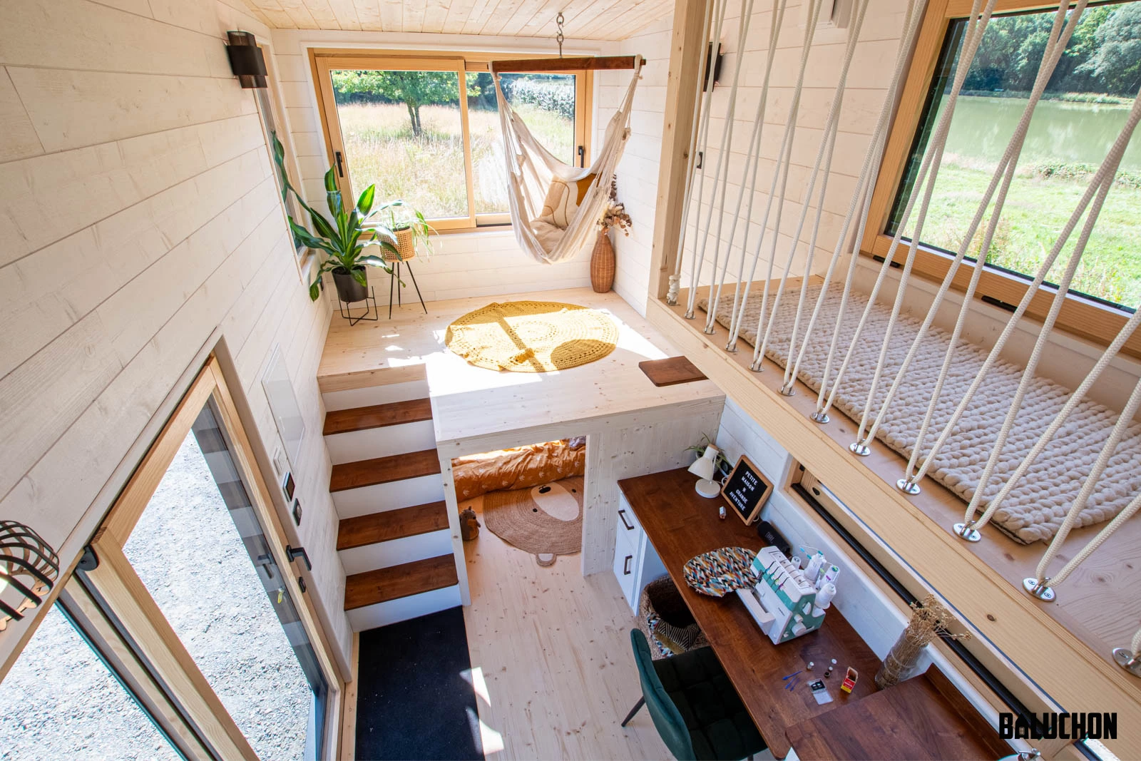 The Nouvelle Dans' interior layout places the living room above the secondary bedroom