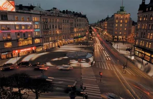 The first project - during the day the blocks appear as concrete pavement, but at sunset they start to shine thank to the light sources placed under them. Aringed light pattern took shape around the main square as dark came.