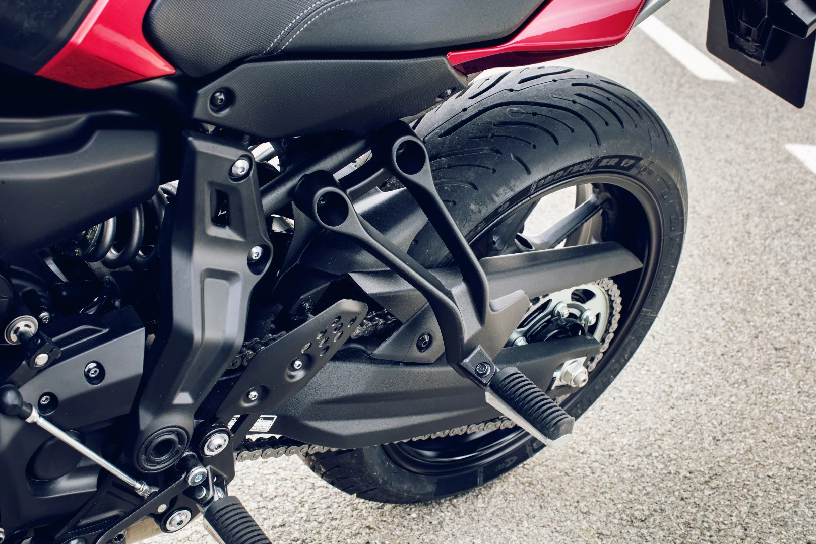 Long supports for the Yamaha Tracer 700 passenger pegs appear to offer ample leg room