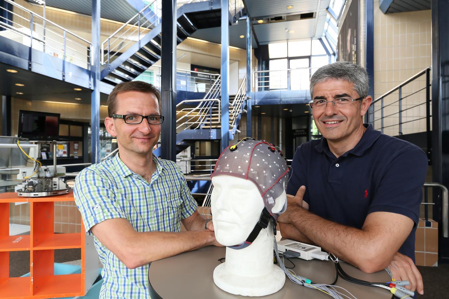 Scientists from École Polytechnique Fédérale de Lausanne show off their brain-computer interface for controlling a robot with your thoughts