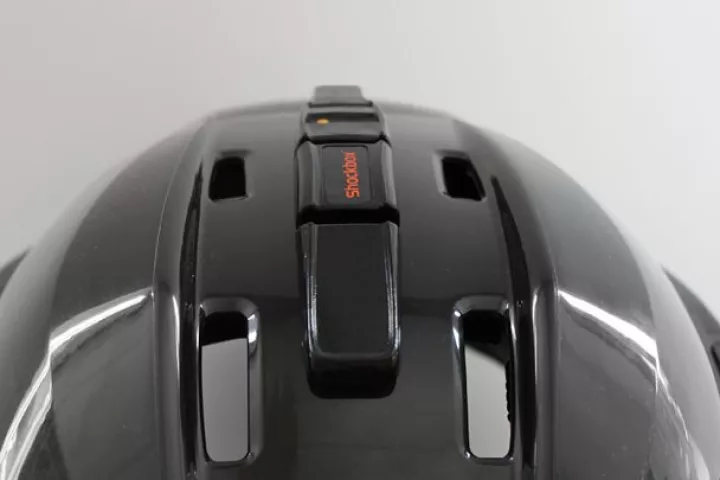 The Shockbox Sensor attaches to an athlete's helmet, and alerts their coach via Bluetooth if they receive a severe head impact