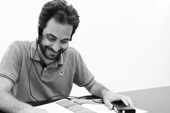 Horus is a wearable device that describes the world to visually impaired people, and can read signs and even books aloud