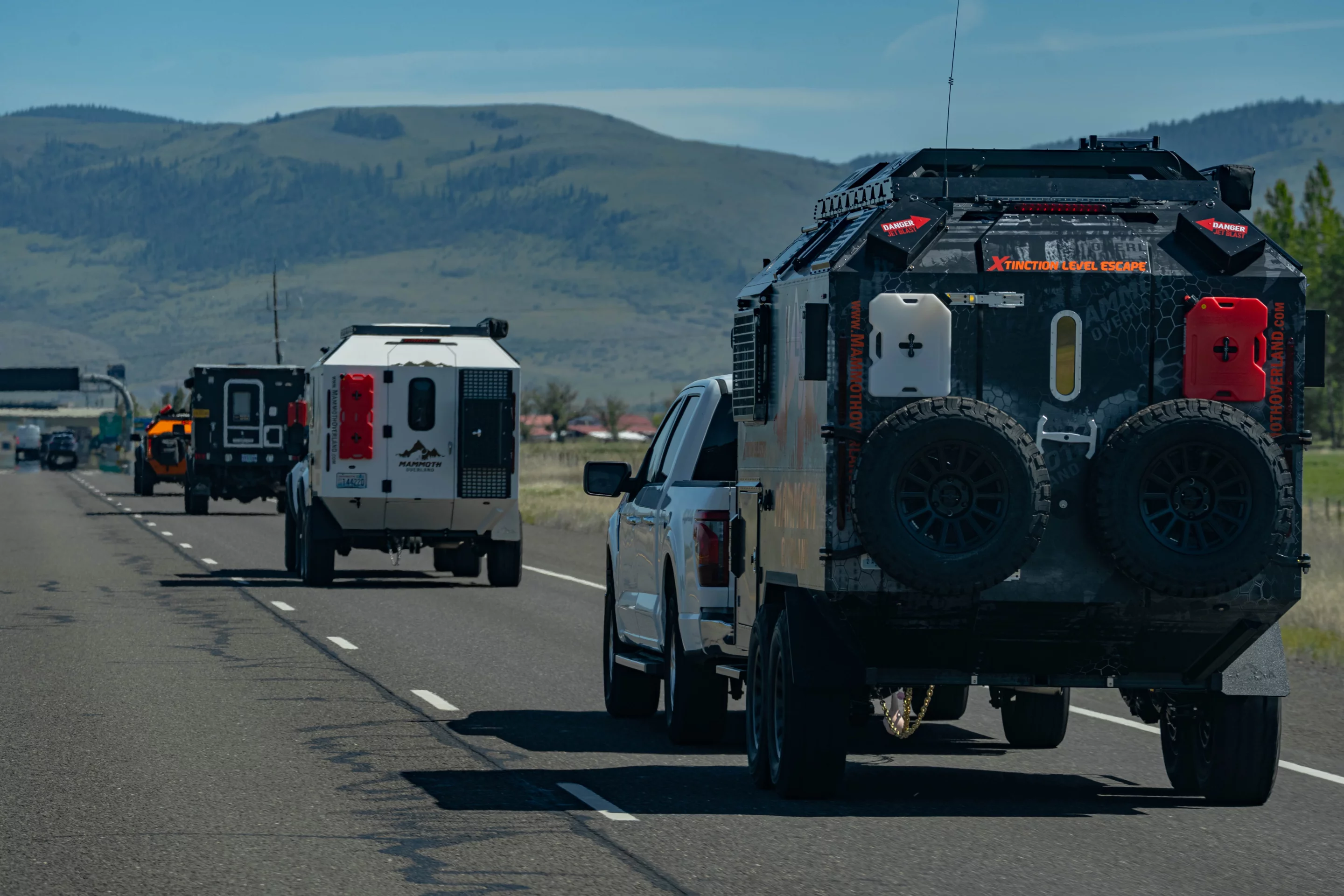 We'd be inclined to flip on local radio pretty quickly if we passed this particular caravan on the highway