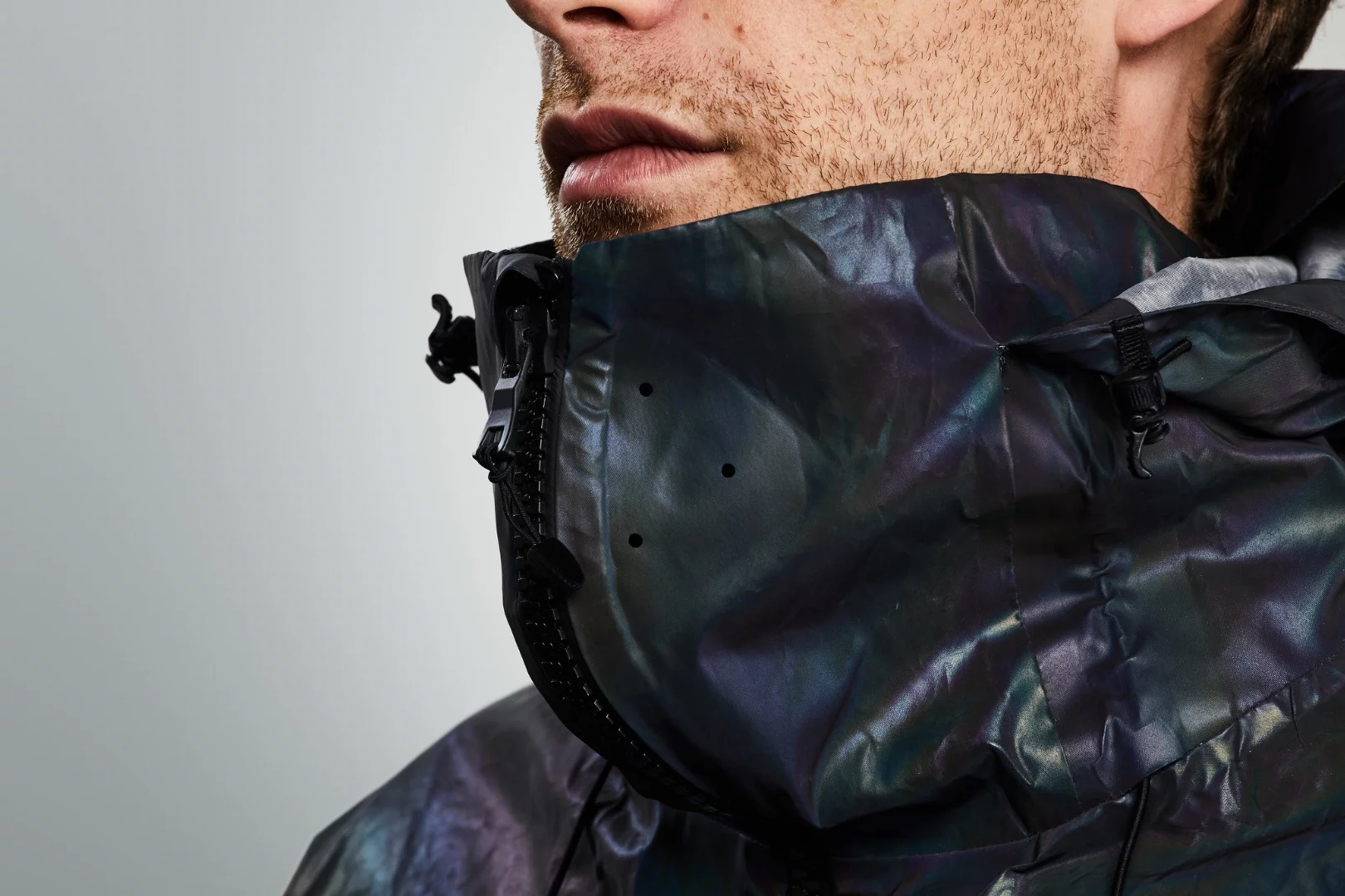 The Black Squid Jacket features a Merino wool-lined collar