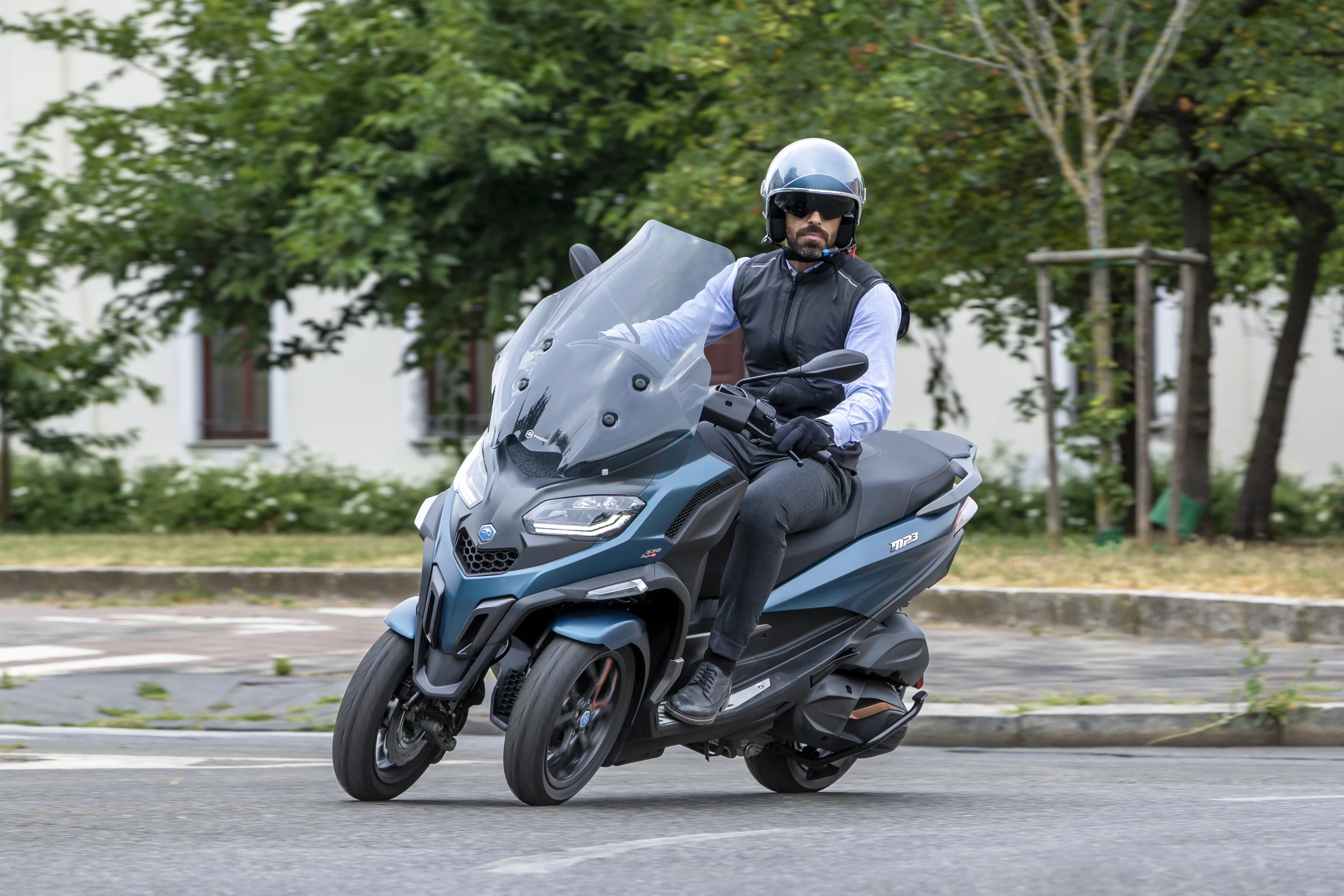 Piaggio's patented front suspension system allows the MP3 to safely lean into corners