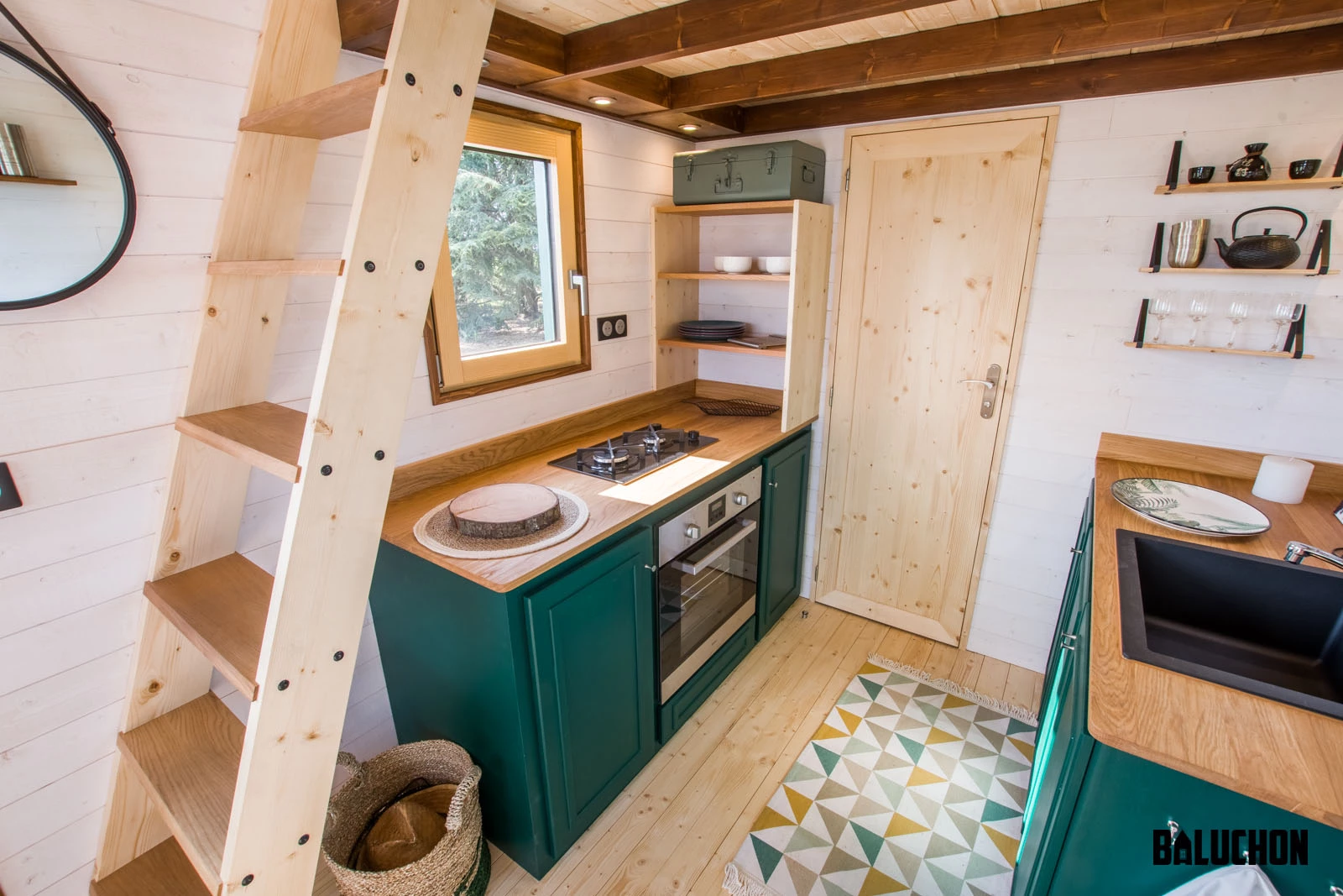 The Hauméa tiny house's kitchen is relatively spacious, compared to previous Baluchon models