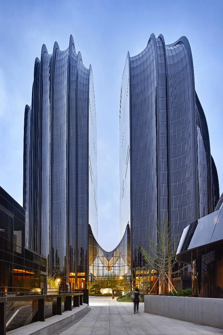 The Chaoyang Park Plaza's towers are joined by a glass atrium