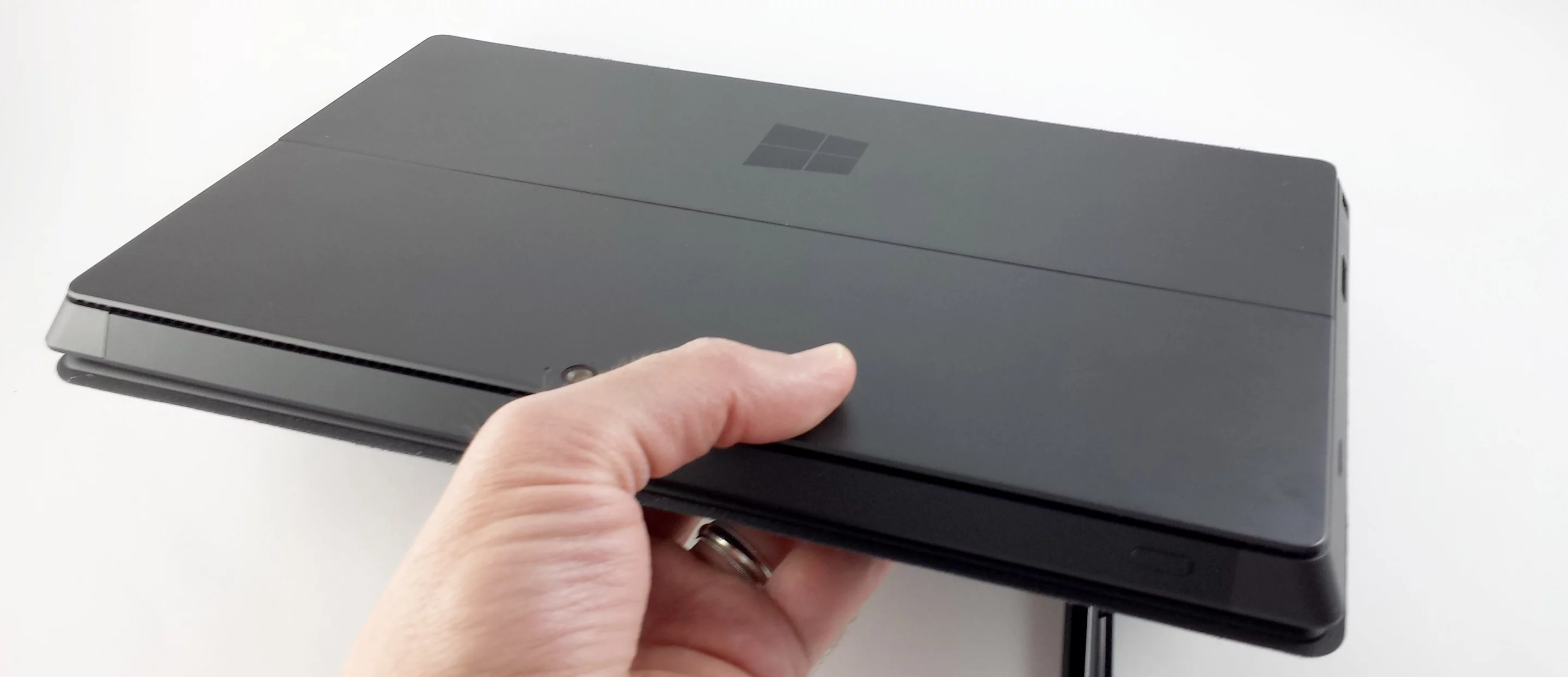 The Surface Pro weighs 907 g alone, and 1,157 g with the Type Cover