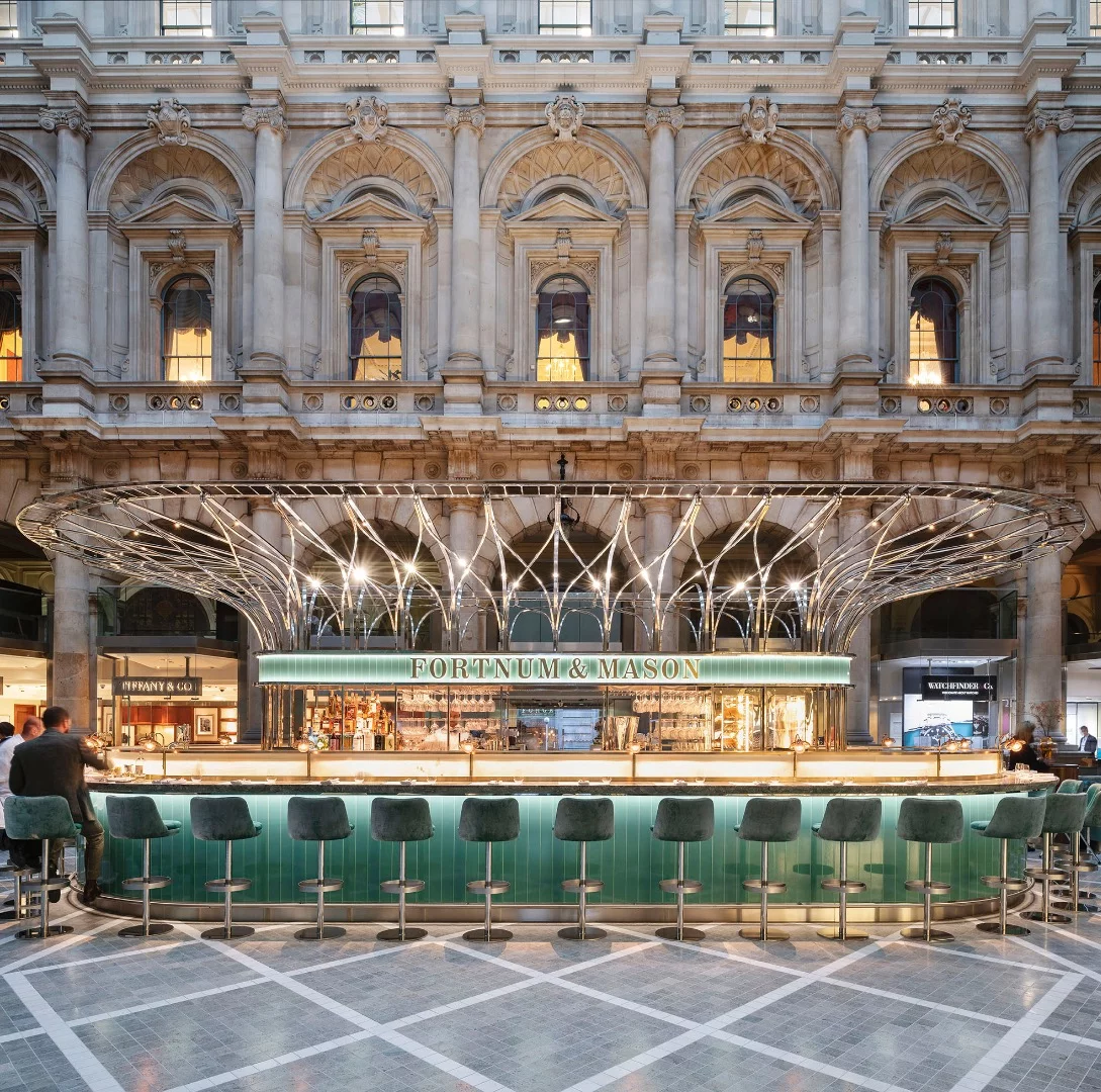 The Fortnum's Bar and Restaurant at The Royal Exchange was designed by Universal Design Studio. The project is located in London, UK, and is a finalist in the Bars & Restaurants category