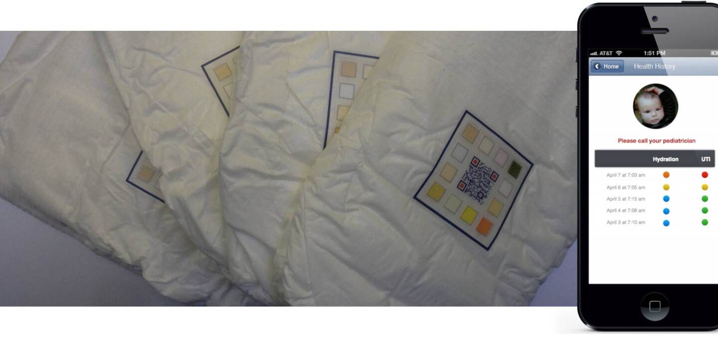 An accompanying app scans the QR code on the outside of the diaper, which is surrounded by the colored results of each test