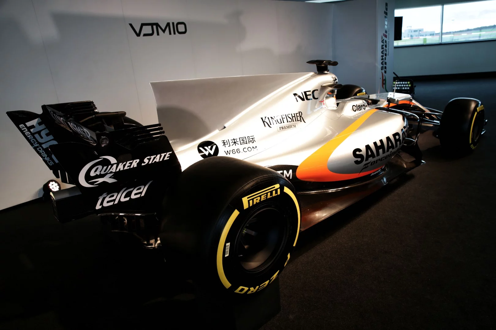 The rear wing on the VJM10 is canted backward slightly