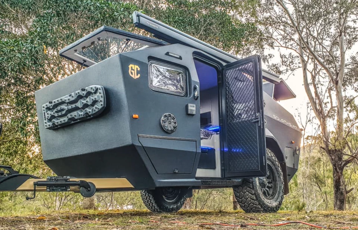 The full-height door and fridge drawer just inside it are rare features on trailers of this size