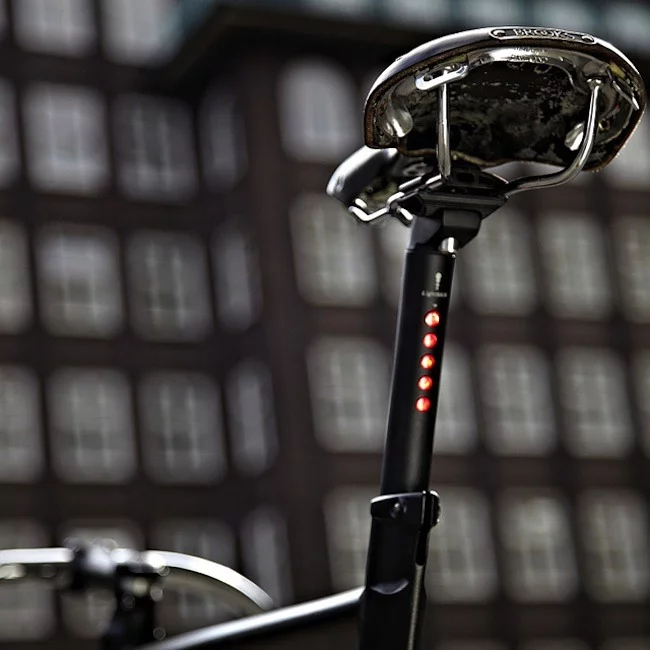 The bike has integrated lights on the seatpost and the handlebars