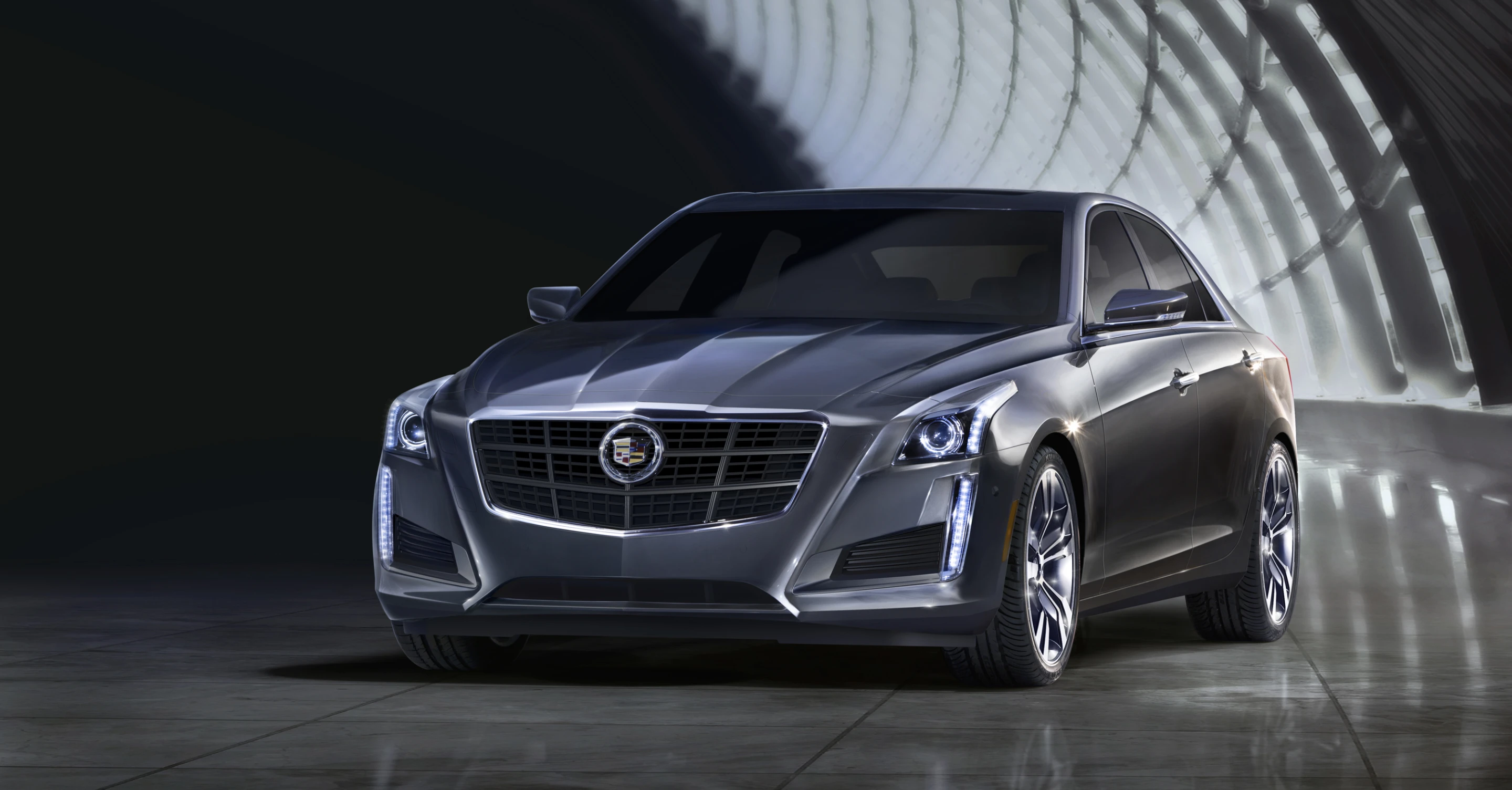 CTS roofline, hoodline are roughly an inch lower giving an even more aggressive stance