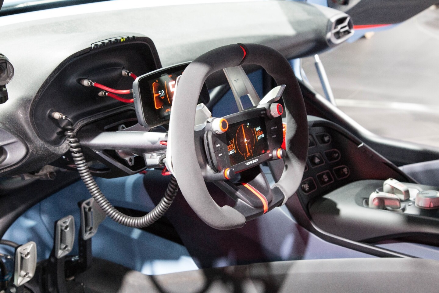 The wheel is pared back, but still gives the driver information