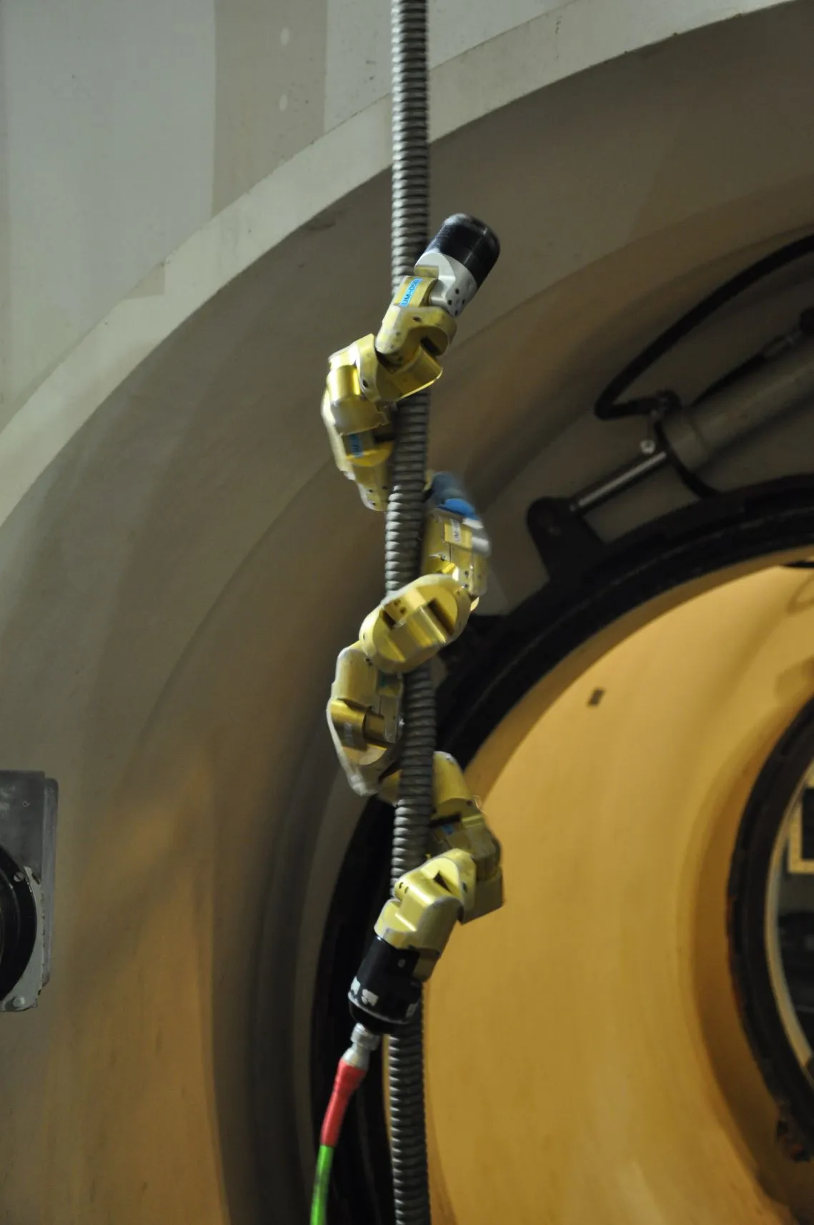 The modular snake robot climbs a pipe inside the Zwentendorf nuclear power plant