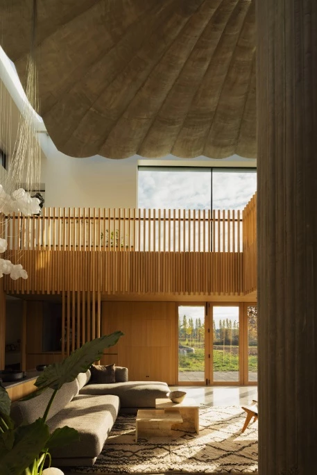 The monumental trumpet-shaped columns set this unique home apart