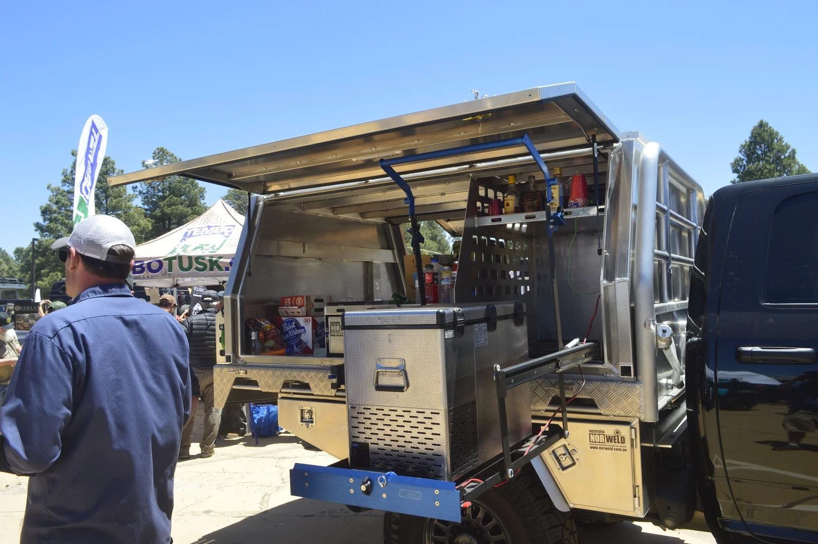 We first checked out Norweld truck canopies and trays at Overland Expo East last October