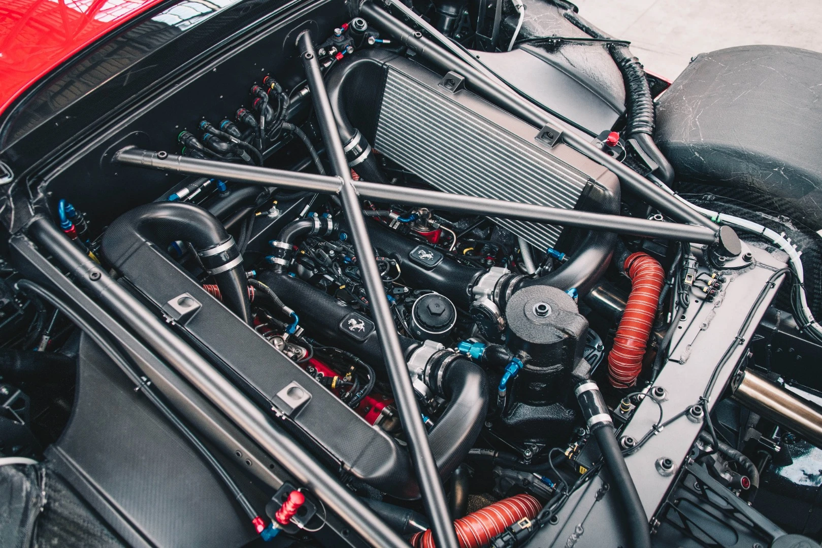 The engine is derestricted. Possibly up to the tune of the 488 Pista motor's 710 hp, possibly more, we don't know