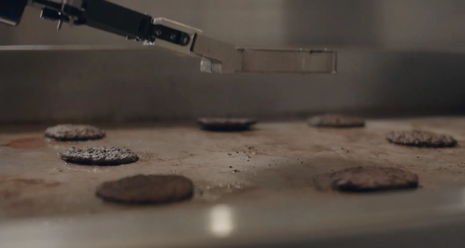 Flippy flips hamburgers, but is designed to be a more general kitchen assistant