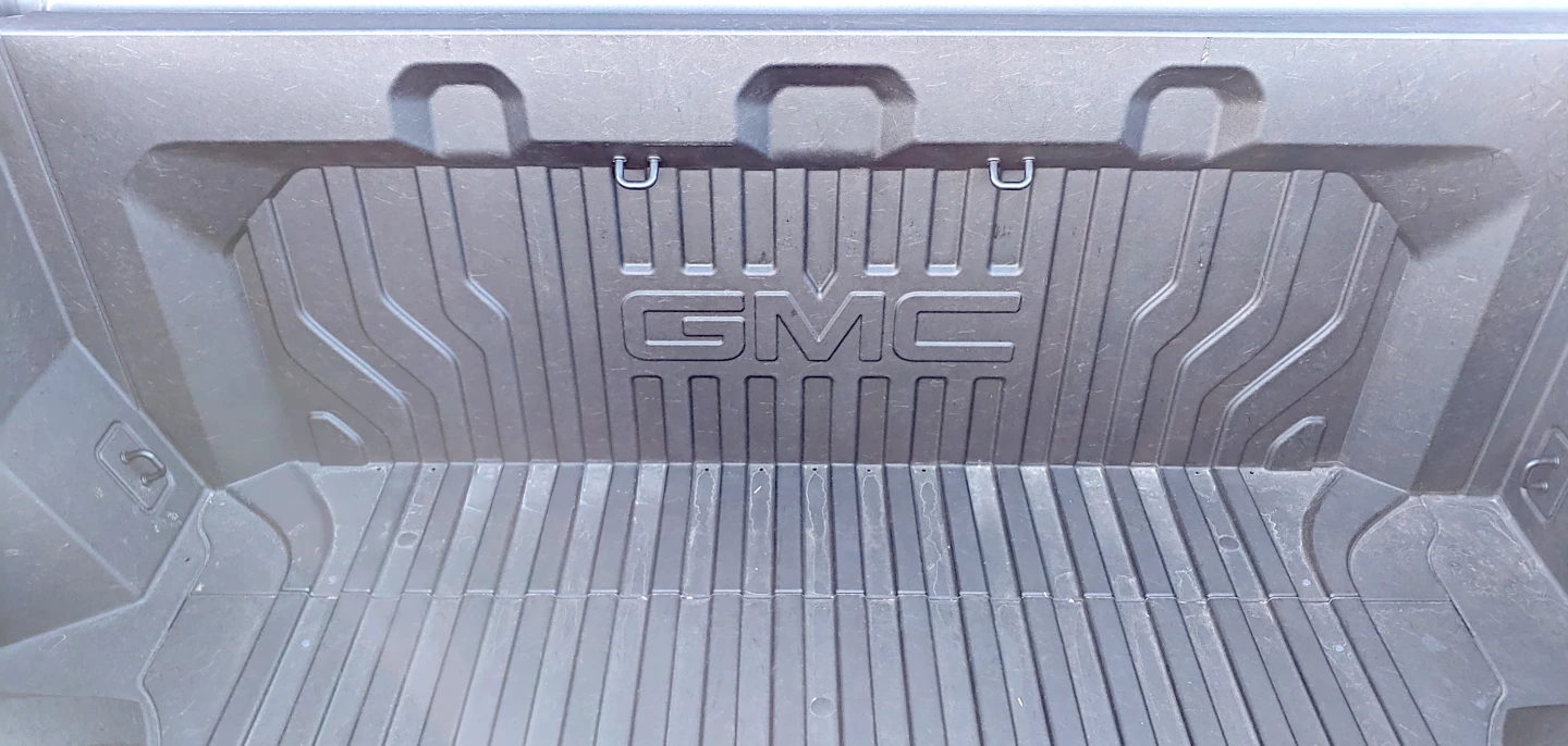 Indents included in the CarbonPro bed accommodate up to two dirt bikes (left and right) or a street bike (center)