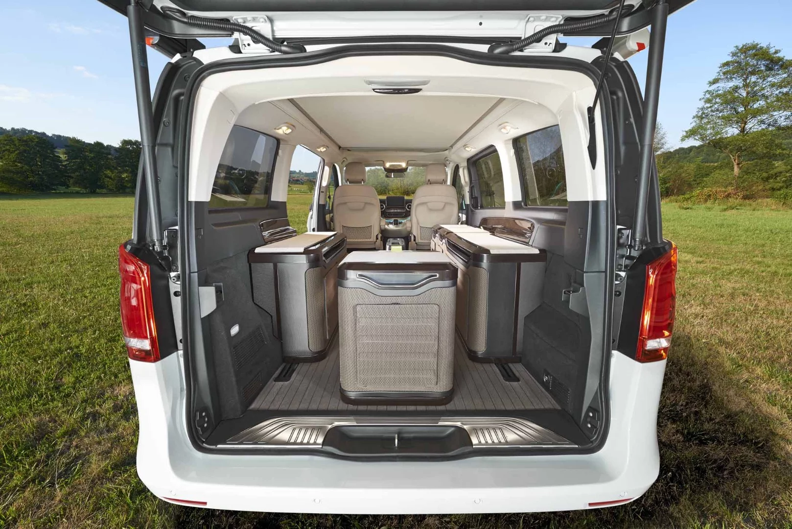 Each module includes a lid, allowing it to serve as a work or storage surface