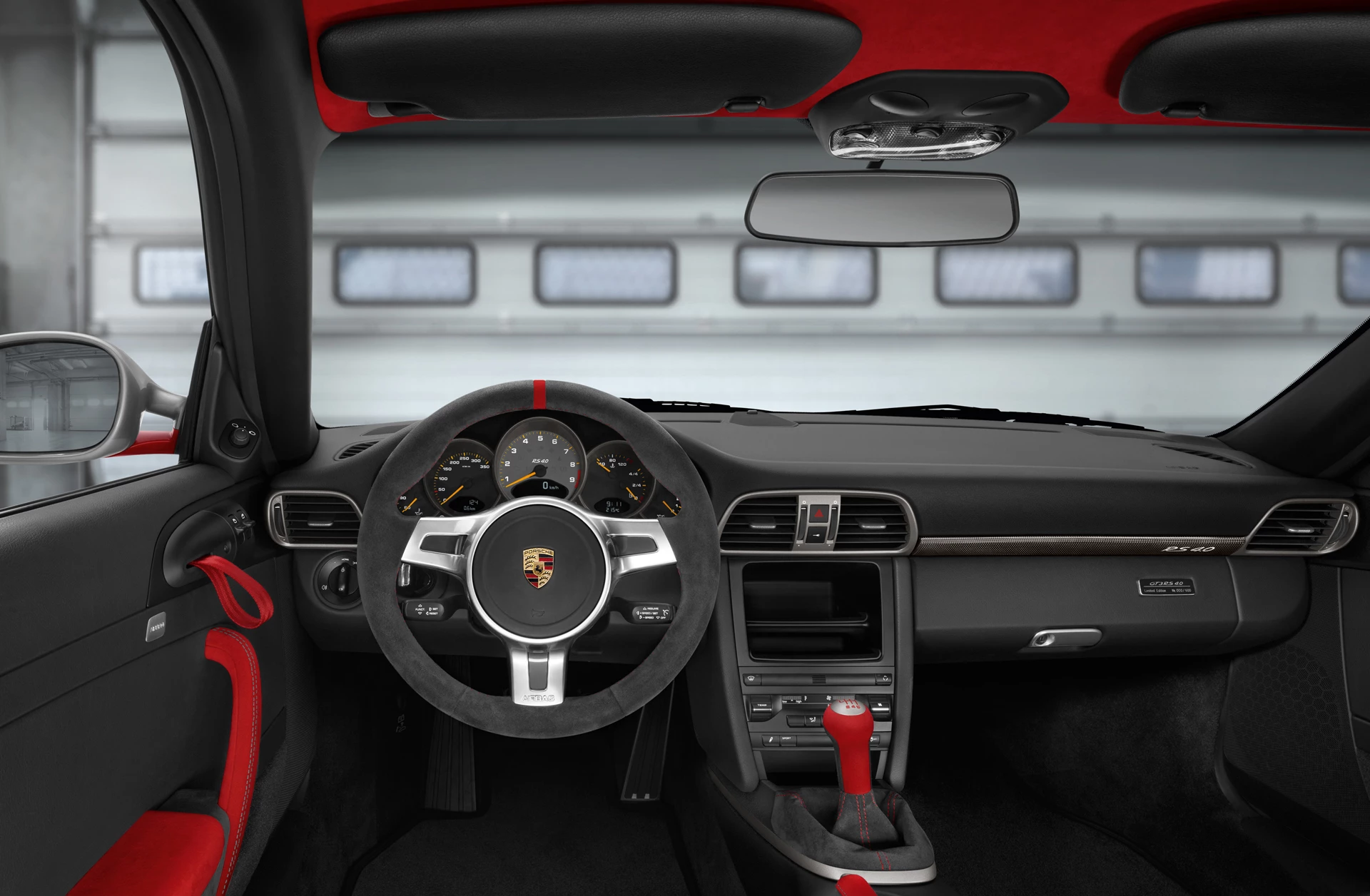 Like its racing sibling, the RS features light weight everything as standard â€" carbon fiber seats, bonnet and front wing, plastic rear windows and even the carpets are "weight-optimised." The diet has yielded a car with a kerb weight of 1,360 kg.