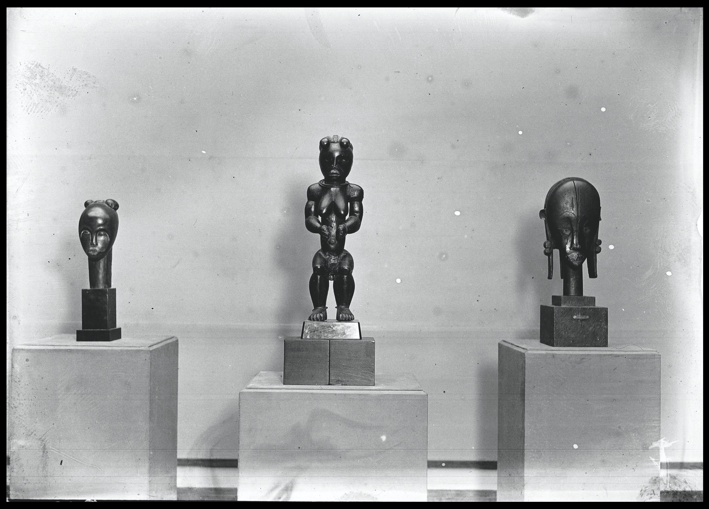 This historic image was taken in 1930 at the Palais des Beaux-Arts of Brussels by the first female journalist in Belgium, Germaine van Parys. It shows three Gabonese Fang artworks that were being exhibited by famous collector, Henri Lavachery.