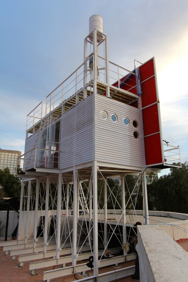 People can only enter and exit through a door concealed on the front of the billboard, though a small balcony does protrude from the back
