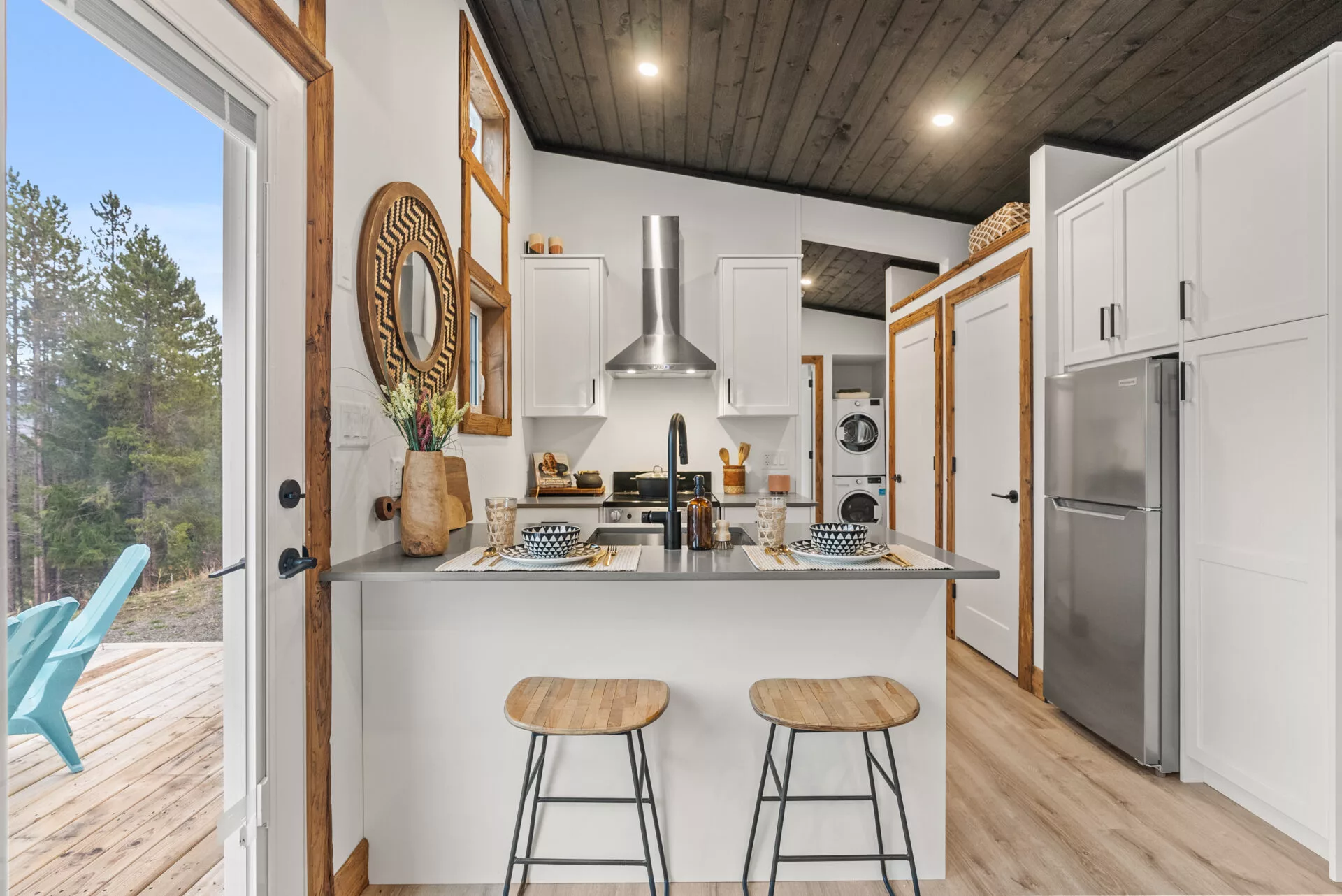 The Silvertip's main entrance connects its outdoor deck area and kitchen