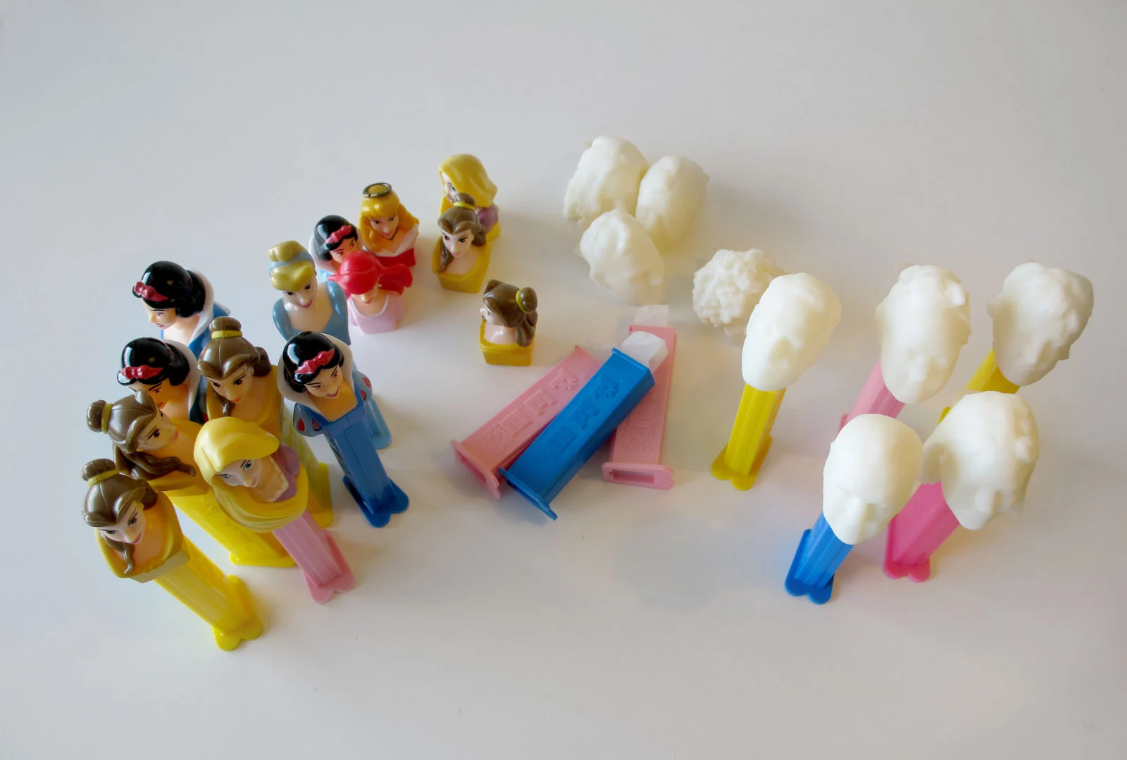 After creating the 3D models, it was just a matter of printing all 32 heads out with a Makerbot Replicator and attaching them to decapitated Pez dispensers