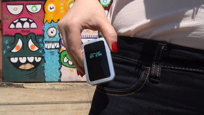 The lighter's display indicates how many cigarettes you've smoked and how long it's been since your last one
