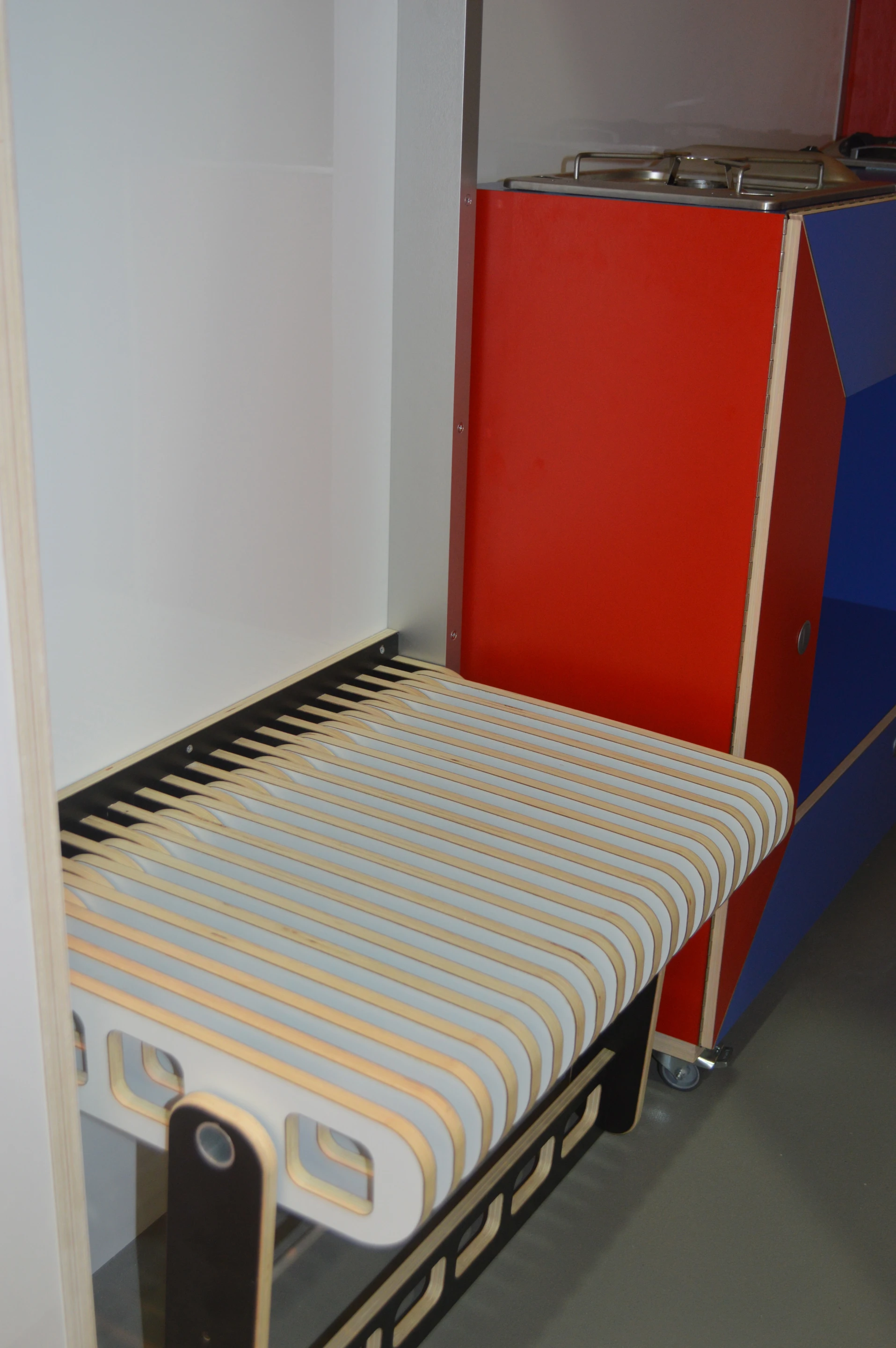 The Speed Wagon has a pair of seats attached to the interior walls